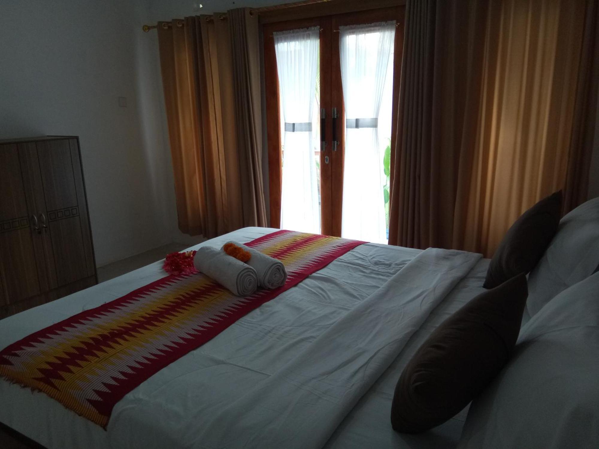 Bagoesfull Homestay Toyapakeh Szoba fotó